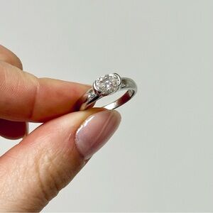 Half Bezel Solitaire 1.5ct Oval Cut Moissanite 925 Silver Travel Ring